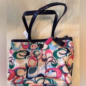 Coach multi color shoulder purse.